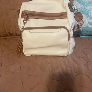 White and Brown Backpack with Textured Material and Multiple Compartments